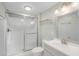 Modern bathroom featuring a glass-enclosed shower and a white vanity at 47 Ashley Ave, Charleston, SC 29401