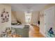 Cozy living room with a couch, a ceiling fan, and hardwood floors at 47 Ashley Ave, Charleston, SC 29401
