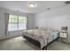 Bright bedroom with large window letting in natural light at 4875 Carnoustie Ct, Summerville, SC 29485
