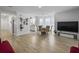 Spacious living room featuring vinyl wood floors and an open layout at 4875 Carnoustie Ct, Summerville, SC 29485