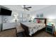 Cozy bedroom featuring a queen-size bed, decorative pillows, and stylish bedside tables with lamps at 524 Cobby Creek Ln, Seabrook Island, SC 29455