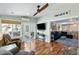 Cozy sunroom featuring sliding glass doors, comfortable seating and windows providing abundant natural light at 524 Cobby Creek Ln, Seabrook Island, SC 29455