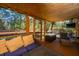 Comfortable screened-in porch with outdoor furniture, perfect for relaxing outdoors at 6024 Meadowcliff Ave, Hanahan, SC 29410