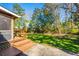 Spacious backyard featuring a well-maintained wooden deck and lush greenery at 6024 Meadowcliff Ave, Hanahan, SC 29410