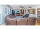 Comfortable living room with large sectional, hardwood floors, and natural light at 6024 Meadowcliff Ave, Hanahan, SC 29410