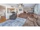 Spacious living room with hardwood floors, large sectional sofa, and open layout at 6024 Meadowcliff Ave, Hanahan, SC 29410