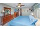 Bedroom with a queen-sized bed, wood furnishings, decor, and comfortable carpet at 6024 Meadowcliff Ave, Hanahan, SC 29410
