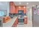 Well-equipped kitchen with cherry cabinets and stainless steel oven at 7 Dogwood Ln, Walterboro, SC 29488