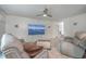 Comfortable living room featuring a mounted TV and tiled flooring at 7 Dogwood Ln, Walterboro, SC 29488