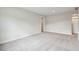 Neutral bedroom with plush carpeting, base molding, and standard electrical outlets at 714 Breakers Reef Ln, Huger, SC 29450