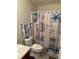 Bathroom featuring a decorative shower curtain with a nautical theme at 7364 Suncatcher Dr, Hanahan, SC 29410