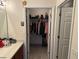 View of well-organized walk-in closet featuring clothes hanging on racks at 7364 Suncatcher Dr, Hanahan, SC 29410
