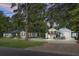 Stunning exterior view showcasing the well-manicured lawn and craftsman home design at 781 E Butternut Rd, Summerville, SC 29483