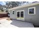 The back patio features access to the home through glass paneled doors, along with room for outdoor seating at 782 Bonham Dr, Charleston, SC 29412