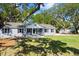 Inviting single story home with a welcoming porch, lovely landscaping, and a freshly updated exterior at 782 Bonham Dr, Charleston, SC 29412