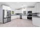 Bright, spacious kitchen with stainless appliances, granite countertops, and ample white cabinetry at 782 Bonham Dr, Charleston, SC 29412