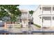 Charming two-story home with white picket fence and well-maintained landscaping at 80 Smith St, Charleston, SC 29401