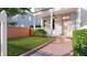 Charming two-story home with a well-kept front yard and inviting entryway at 80 Smith St, Charleston, SC 29401