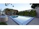 Inviting pool with a wood deck and charming pergola-covered seating area for relaxing and entertaining at 80 Smith St, Charleston, SC 29401