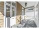 Charming porch featuring white columns and a decorative hanging light fixture at 80 Smith St, Charleston, SC 29401