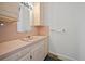 Bathroom featuring a vanity with sink, toilet, shower with curtain and updated hardware at 901 Morton Waring Ln, Pinopolis, SC 29469