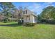 Attractive single-story home with a quaint, welcoming front entrance and landscaped yard at 901 Morton Waring Ln, Pinopolis, SC 29469