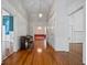 Hallway with gleaming hardwood floors, and a grand piano at 901 Morton Waring Ln, Pinopolis, SC 29469