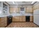 Functional kitchen featuring light wood cabinets, tile floors, and vintage-style appliances at 901 Morton Waring Ln, Pinopolis, SC 29469