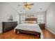 Serene main bedroom featuring a large bed, hardwood floors, and ample natural light at 9690 Seminole Way Way, Summerville, SC 29485