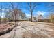 Spacious backyard with mature trees and privacy fence at 106 Ranworth Ln, Summerville, SC 29485