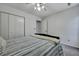 Neutral bedroom with a ceiling fan, double closet, and carpet at 106 Ranworth Ln, Summerville, SC 29485