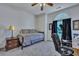 Bright room with a trundle bed, a desk with a chair, an exercise bike, and an arched window at 106 Ranworth Ln, Summerville, SC 29485
