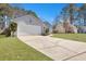 Exterior view of single story home featuring attached two-car garage and concrete driveway at 106 Ranworth Ln, Summerville, SC 29485