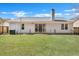 Home with a sliding glass door to the backyard and a fenced in area at 106 Ranworth Ln, Summerville, SC 29485