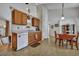 Bright kitchen and dining area features wood cabinetry and eat-in dining set at 106 Ranworth Ln, Summerville, SC 29485
