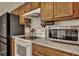 Kitchen with modern appliances including a stainless steel microwave and electric cooktop at 106 Ranworth Ln, Summerville, SC 29485