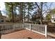 View of the wooden deck and the surrounding fenced backyard at 109 Presidio Bnd, Summerville, SC 29483