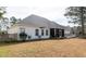 Long shot of a fenced-in backyard and deck area at 109 Presidio Bnd, Summerville, SC 29483
