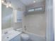 Bright bathroom with a white vanity, toilet, and tiled shower-tub combination, offering a clean and functional space at 109 Presidio Bnd, Summerville, SC 29483