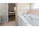 Bright bathroom showcasing a modern walk-in bathtub with safety features and stylish fixtures at 109 Presidio Bnd, Summerville, SC 29483