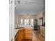 Bright eat-in kitchen with wood floors, cabinets, stainless steel dishwasher, and natural light at 109 Presidio Bnd, Summerville, SC 29483