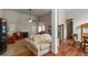 Open-concept living room with a fireplace, dining area, and a view of the kitchen at 109 Presidio Bnd, Summerville, SC 29483