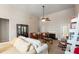 Inviting living room showcasing a fireplace, elegant decor, and an open layout at 109 Presidio Bnd, Summerville, SC 29483