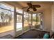 Cozy screened-in porch with a ceiling fan, offering a relaxing outdoor space at 109 Presidio Bnd, Summerville, SC 29483