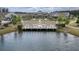 Beautiful lakefront clubhouse with outdoor amphitheater, pier and seating with lush landscaping at 115 Bluff Isle Ct, Summerville, SC 29486