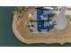 Stunning aerial view of houses with a beautifully landscaped yard, backing onto a tranquil lake at 115 Bluff Isle Ct, Summerville, SC 29486