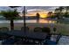 Backyard view featuring a patio and lake, ideal for outdoor dining and entertaining at 115 Bluff Isle Ct, Summerville, SC 29486