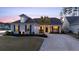 Beautiful home with manicured lawn and mature landscaping at 115 Bluff Isle Ct, Summerville, SC 29486