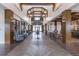 Grand entryway with wooden columns, herringbone floors, and stylish furnishings at 115 Bluff Isle Ct, Summerville, SC 29486