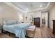 This bedroom features hardwood floors, a ceiling fan, neutral walls, and a wicker bench at 115 Bluff Isle Ct, Summerville, SC 29486